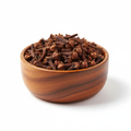 Whole cloves in a wooden bowl on white background